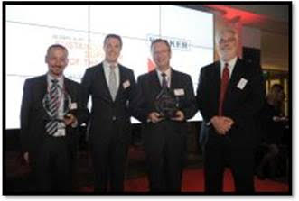 Sjaak Elmendorp, Vice President Innovations at Avery Dennison (right), and Pascal Braker, Commodity Leader Chemicals Europe (second from left), presented this year’s supplier award for  sustainability. WACKER Executive Board member Auguste Willems (second from right) and Daniele Borlatto, Executive Vice President and President Release Liners at Munksjö, accepted the awards.  (Photo: Avery Dennison)