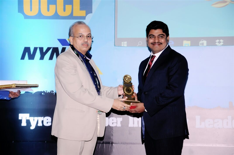 Neelanjan Banerjee receiving the award on behalf of LANXESS India